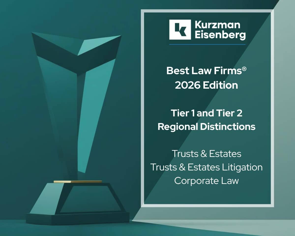 An illustrative graphic celebrating Kurzman Eisenberg's status among the "Best Law Firms" in the region.
